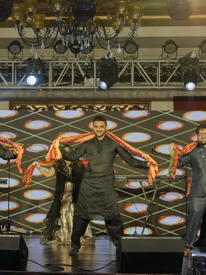 The groom's crew bringing the energy with a classic Bollywood number. We love incorporating fun props like these dupattas to add color and flair to the performance.
