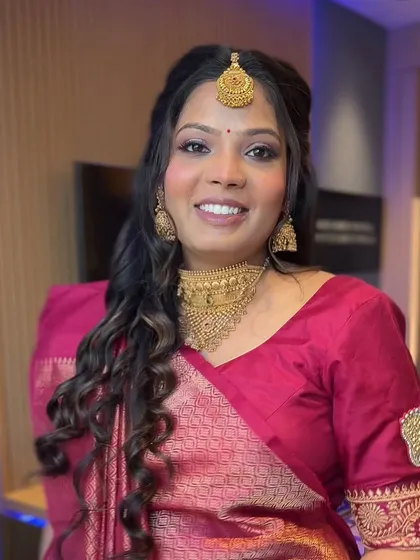 The complete look, with a Kanjivaram saree and beautiful temple jewelry. The makeup is elegant and timeless.