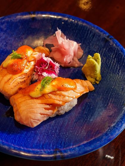 The perfect balance of smoky, fresh, and flavorful. Our Aburi Salmon Nigiri is lightly torched to enhance its richness, creating a sushi experience that is pure bliss.