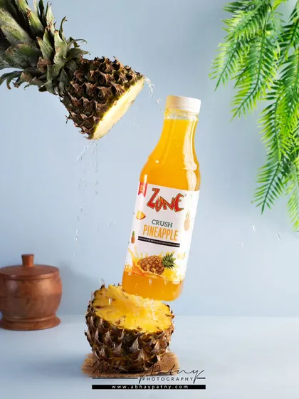 Creating dynamic and gravity-defying shots like this is a passion of mine. This levitation photograph for a pineapple crush was achieved through a multi-shot composite process, designed to stop the scroll and capture immediate attention on social media.
