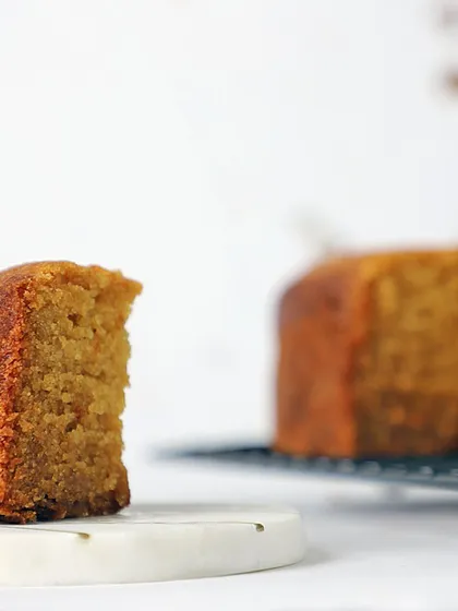You can't go wrong with a classic vanilla cake. Mine is wonderfully gooey and delicious, made with love and without any sugar, butter, or maida. It's a simple slice of heaven.