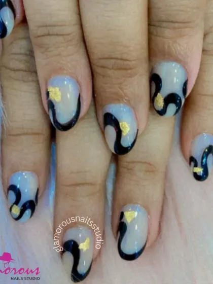 A sophisticated abstract design featuring a sheer base with bold black swirls and delicate gold foil accents.