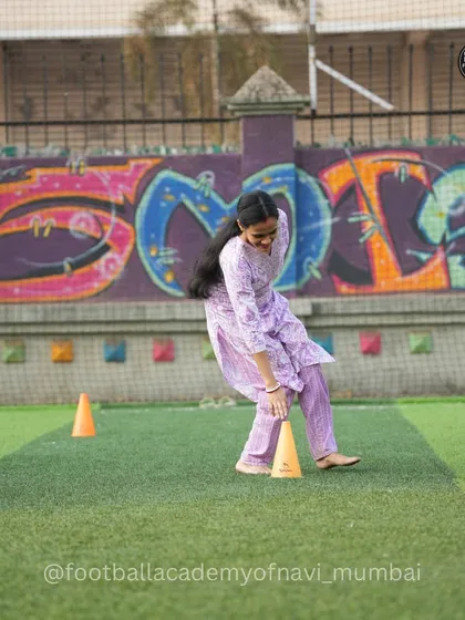 Even simple cone drills become a source of laughter and fun during our parent-child football days. It's all about participation and enjoying the moment.