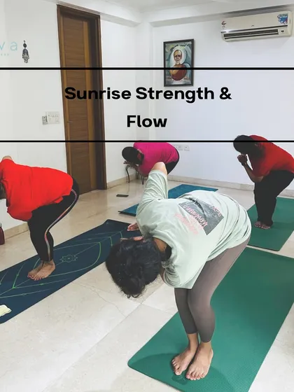 Students in our Sunrise Strength & Flow class practice Parivrtta Utkatasana, or Revolved Chair Pose. This twisting pose is excellent for detoxifying the body, strengthening the core and legs, and building focus first thing in the morning.