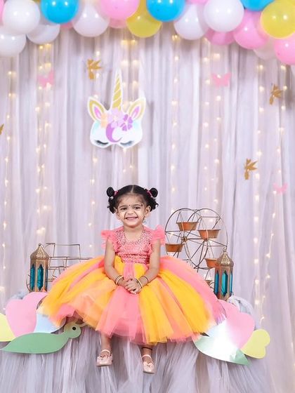 A playful 'Masha and the Bear' themed birthday party, with forest decor, character cutouts, and colorful balloons, perfect for a fun-filled adventure.