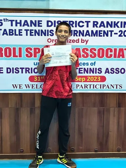 Johan Cheriparambil with his certificate after winning the gold medal in the U-15 category at the 5th District Ranking Tournament.