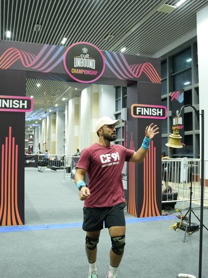 Ringing the bell at the finish line. This is the feeling of accomplishment we train for, the reward for all the hours of hard work.