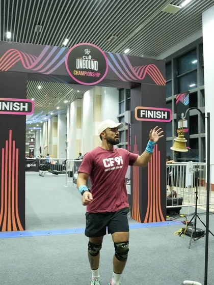 Ringing the bell at the finish line. This is the feeling of accomplishment we train for, the reward for all the hours of hard work.