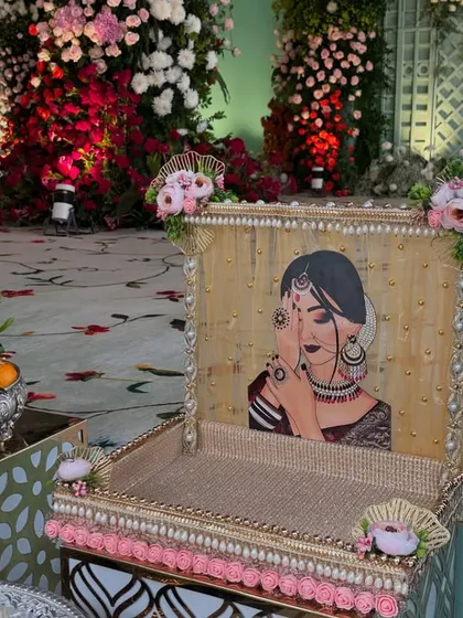 A custom-made, hand-painted tray used for presenting gifts or offerings during a ceremony.