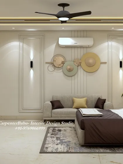 The wall opposite the bed features a comfortable sofa and modern, circular wall art, creating a perfect spot for reading or relaxing.