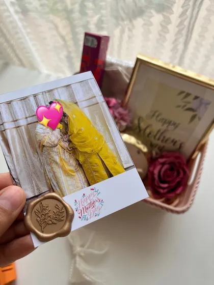 I love adding personal touches, like this polaroid photo with a wax seal, to make a Mother's Day gift even more special.