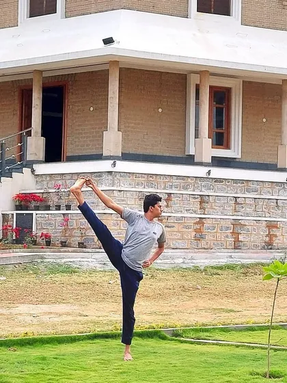 This is Trivikramasana, a challenging standing pose that honors Lord Vishnu's incarnation as Vamana. Each asana I teach carries a story, and understanding these mythological roots adds a deeper layer of meaning and purpose to our physical practice.