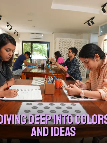 A wide view of our studio during a class, showing participants comfortably spread out and immersed in their work. We ensure ample space and resources for every individual to explore their ideas.
