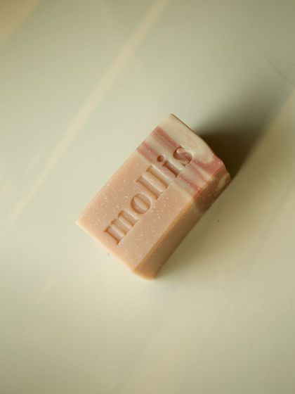 A single 'Flower Market' bar, showcasing its simple elegance and stamped logo.