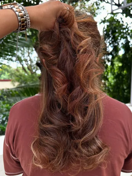 Travel ready. A good hair color and style can make you feel put-together and confident, no matter where you're heading. This warm, multi-tonal look is perfect for any adventure.