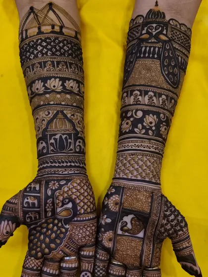 A bold and beautiful design with heavy use of negative space to make the peacock and elephant motifs pop.