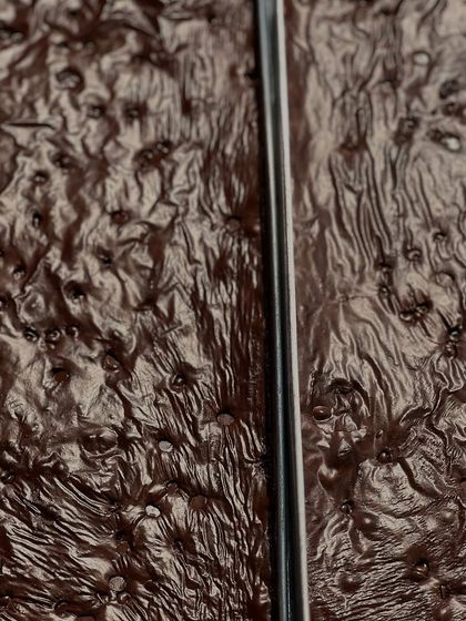 A close-up of the beautiful, crinkly top of our classic fudgy brownies. This is the sign of a perfectly baked brownie.