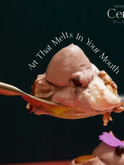 Art that melts in your mouth. A spoonful of mousse, showcasing its light and airy texture.