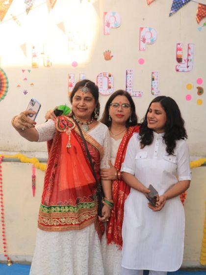 Capturing memories at our studio's Holi party. Events like these are a wonderful opportunity for our members to bond outside of regular dance classes.