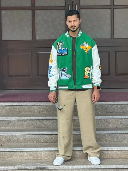 A full-length shot of the streetwear look, showing the complete outfit from head to toe.