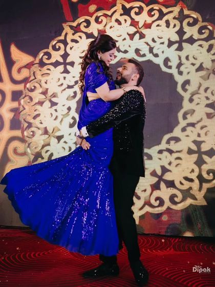 A classic romantic lift against a beautiful backdrop. We teach you how to execute these moments safely and gracefully for a perfect photo finish.