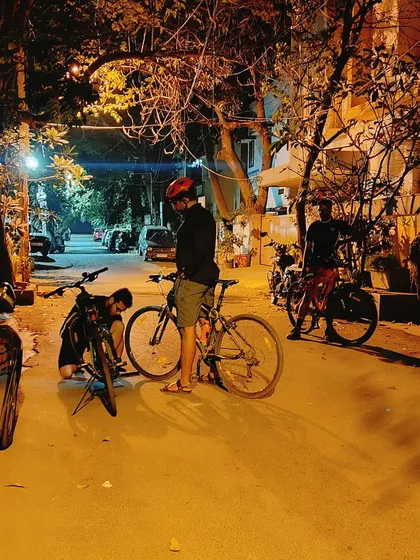 A candid moment during our Republic Day ride, with one cyclist checking on his bike. We casually ride through quiet lanes, but we always make sure our gear is in check and we look out for one another.