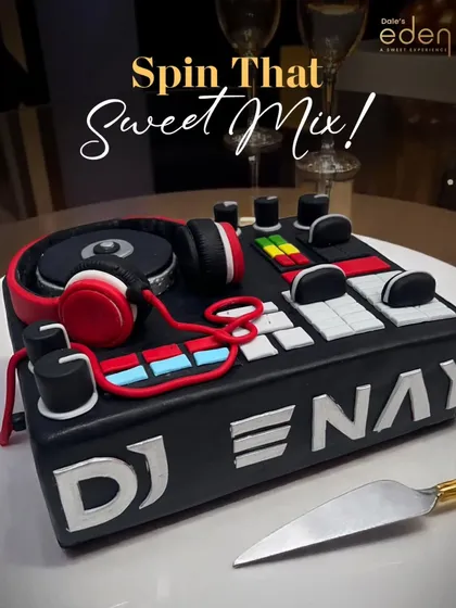 For the music lover in your life, I designed this custom DJ console cake. It features edible headphones, mixers, and turntables, making it the perfect centerpiece for a DJ's birthday bash.