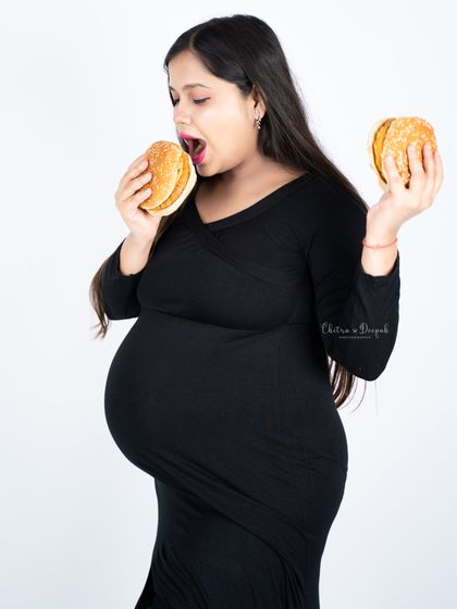When the cravings hit! We had so much fun capturing this mom-to-be enjoying her favorite burgers during this playful maternity shoot.