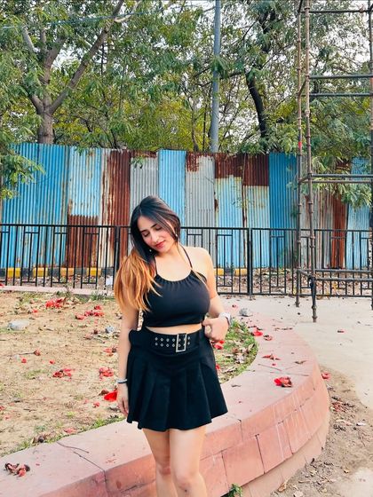 A final shot of the versatile black skater dress. This is a staple piece that can be styled in so many ways.