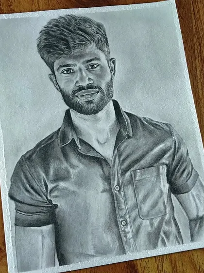 A commissioned portrait of a man with a beard, focusing on a natural and friendly expression.