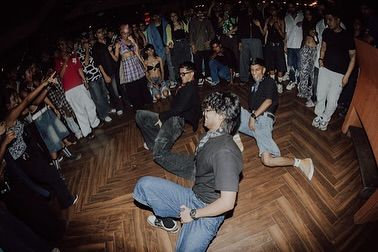 In the zone with my crew during a live club performance. We feed off the crowd's energy to create an unforgettable party atmosphere.