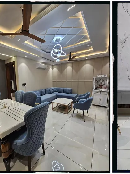 Another angle of the same living room, showing the relationship between the seating area and the dining table. The consistent color palette and materials create a unified and spacious feel.