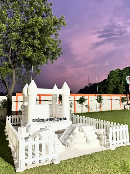 A beautiful twilight shot of our white play area, demonstrating that the fun doesn't have to stop when the sun goes down.