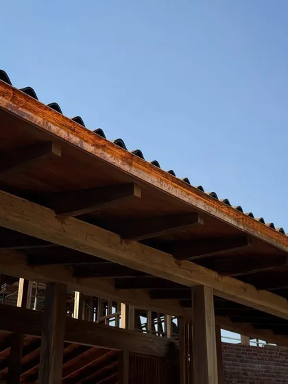 A detail shot where the timber roof structure meets the copper gutter. We believe that even the most functional elements of a building should be beautifully designed and crafted.