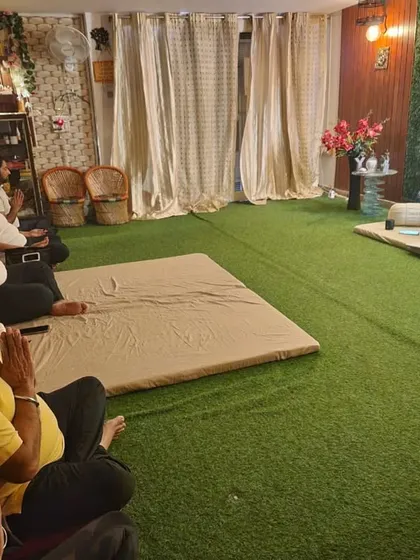 A glimpse into an in-person group meditation session at my Aura Yog Centre. Here, a community of seekers gathers to connect, heal, and support one another on their spiritual path, guided by me through the process of ancestral connection.