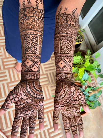 A full view of the arms, showing the complete design.