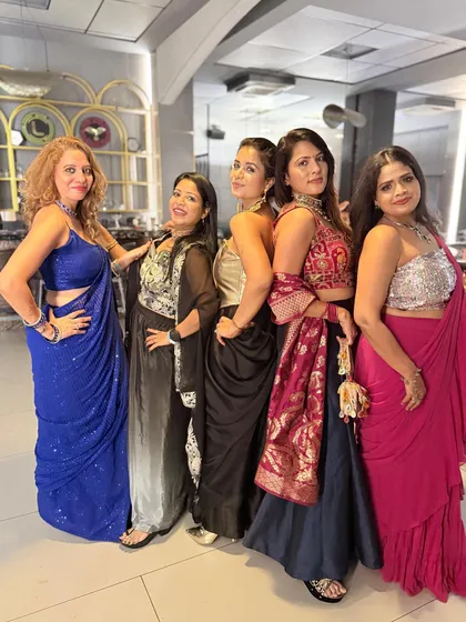 A group of friends celebrating Diwali in style. It’s wonderful to see them all dressed in beautiful ethnic and fusion wear, adorned with statement necklaces and earrings.