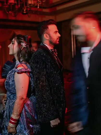 A motion-blur shot to capture the energy of the Sangeet dance floor. This artistic effect conveys the fast-paced fun of the night.