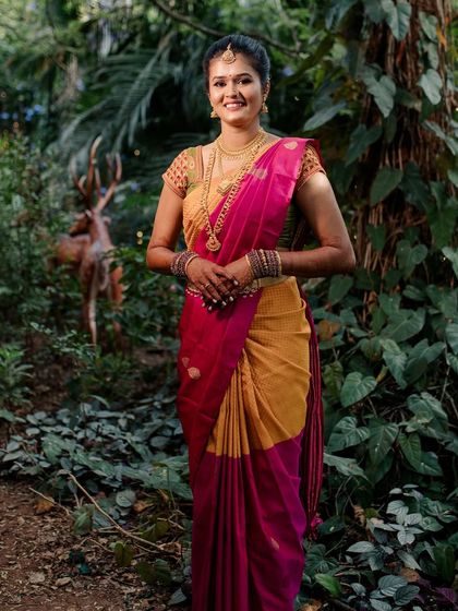 A full-length shot of Sushma in her beautiful Muhuratam saree, looking elegant and poised.