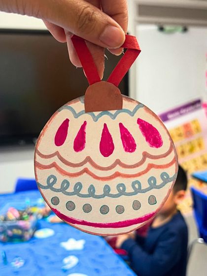 A handmade Christmas ornament created by a kindergartener in one of our festive workshops in a New York school.