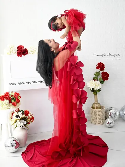 The purest love between a mother and her child. Dressed in stunning matching red gowns, this moment of joy is what I strive to capture in every family session. These are the memories that fill your heart.