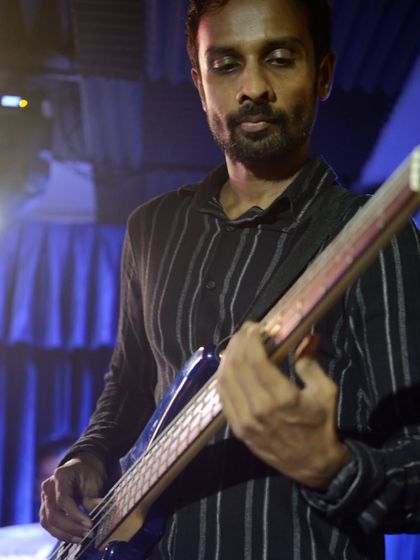 Our bass instructor laying down a solid groove during the student showcase. Our teachers often play alongside students, providing a professional backbone to the performance.