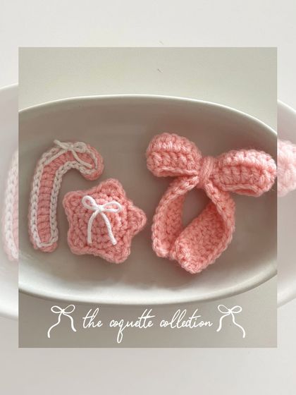 The 'coquette edit' from my Christmas collection. This set includes a candy cane, star, and bow in a delicate pink and white color scheme, perfect for a soft, feminine aesthetic.