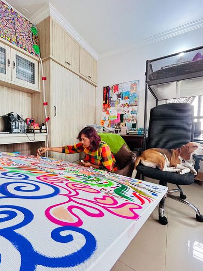 A wider view of my workspace. My art and my life are completely intertwined, and my dog Bingo is always a part of it.