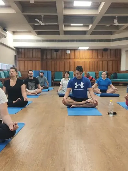 A wider view of the meditation practice with our international students. We guide them to find stillness and connect with their inner selves.