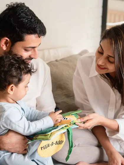 Magical mornings at home. A lifestyle session is about documenting your family's routine, like reading a favorite book together in the morning light.