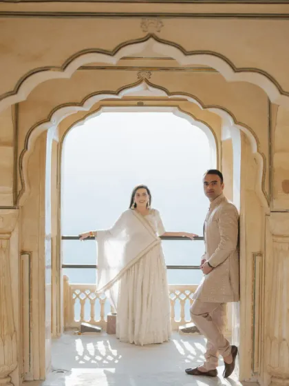 Simplicity and elegance are key. Using the stunning archways of Nahargarh Fort, I framed this couple against the open sky, creating a clean, sophisticated pre-wedding portrait that highlights their style and poise.