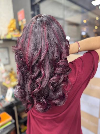 The back view of this Plum Red look shows the perfect distribution of highlights through the rich, dark base colour.
