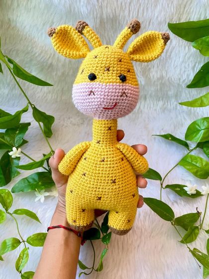 My bestseller giraffe doll is always a favorite. With its long neck, sweet smile, and spotted pattern, it's a cheerful and friendly companion for any child. This one is a larger size for extra big hugs.
