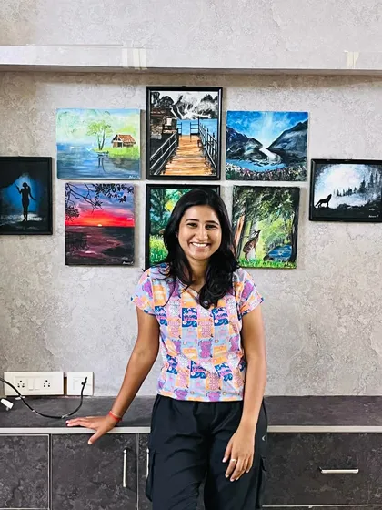 A proud moment with some of my early canvas paintings. This collection of nature and landscape art represents the start of my journey and reminds me to always trust the process. Each piece, from sunsets to forest scenes, holds a special memory.